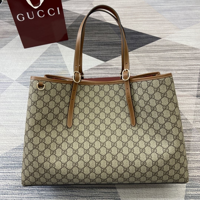 G*u*i shopping bags